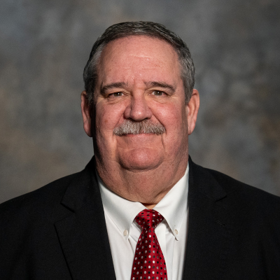 Professional portrait of Mayor John Gates