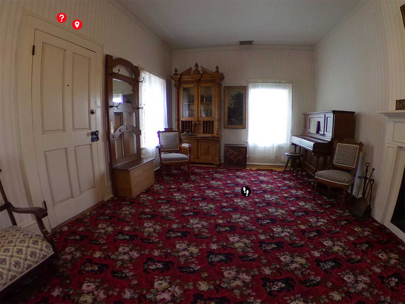 Screenshot of the virtual tour application showing an interior fisheye view of the Meeker Home parlor area, with historic furnishings and fireplace
