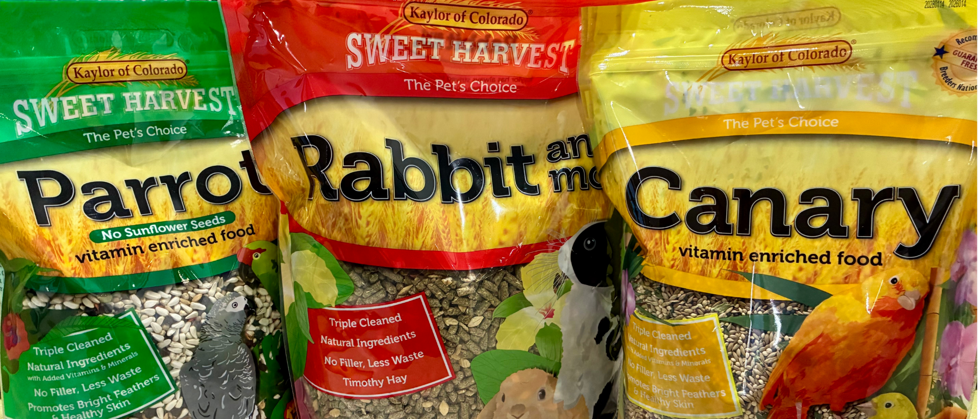 Kaylor of Colorado Parrot, Rabbit and Canary pet food bags.