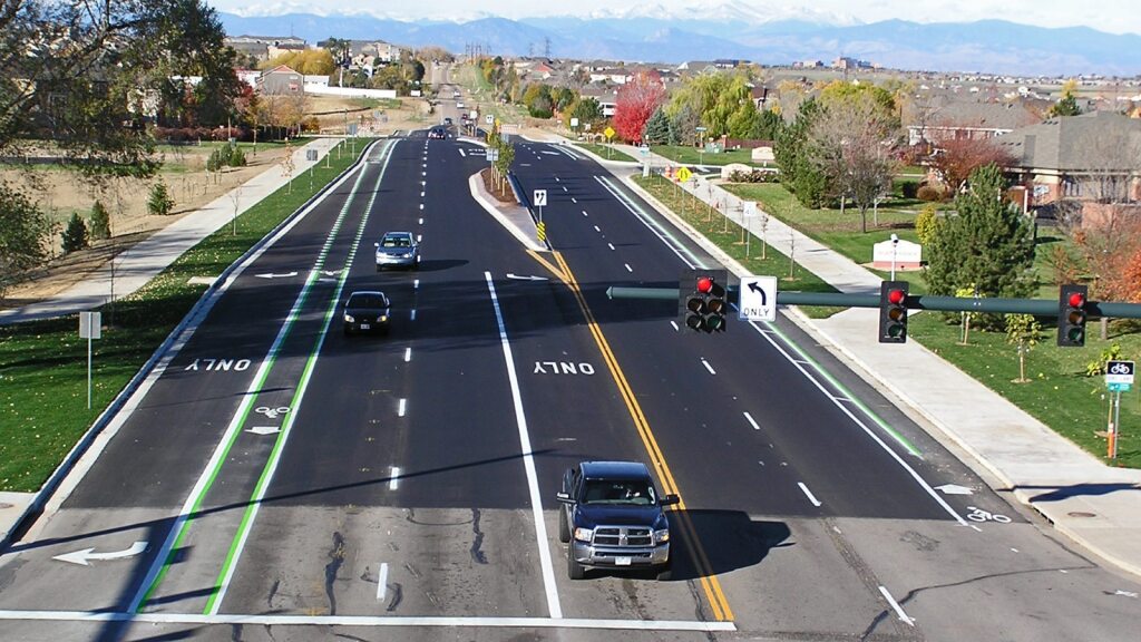 Photo showing stoplight and waiting traffic at the Greeley intersection of 71st Ave and 20th Street.