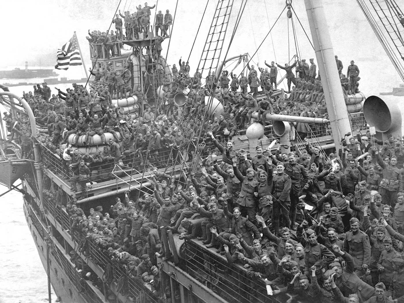 Historic photograph of American soldiers returning from WWI on the USS Agamemnon, Hoboken, New Jersey, 1918
