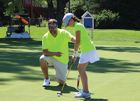 An initiative encouraging junior golf participation with free sessions on Sundays after 1 pm when accompanied by an adult.