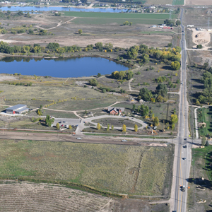 An overhead perspective showcasing 83rd Avenue and surrounding landscapes in Greeley.