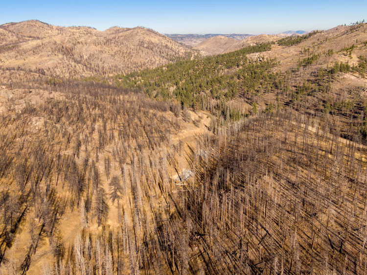 An aerial perspective showcasing the landscape of Kyle Gulch post environmental changes.