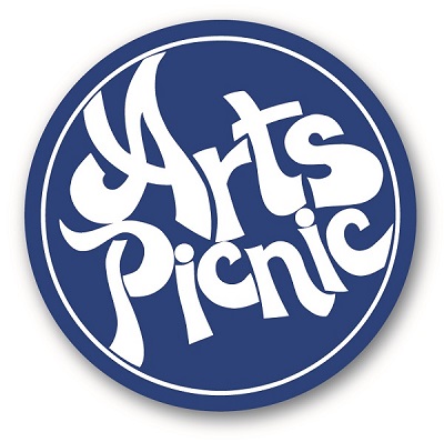 A blue and white circular logo for the Arts Picnic event, featuring creative typography.