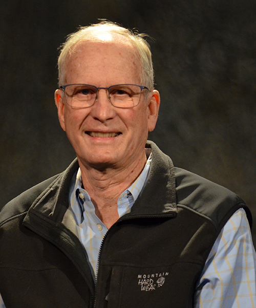 Photo of Fred Otis, showcasing his professional attire.