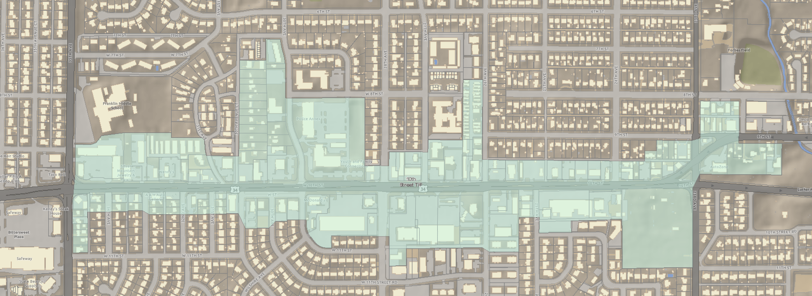 This image depicts a parcel map with the 10th Street Tax Increment Financing (TIF) District outlined and highlighted in green. The TIF District follows the 10th Street Urban Renewal Corridor.