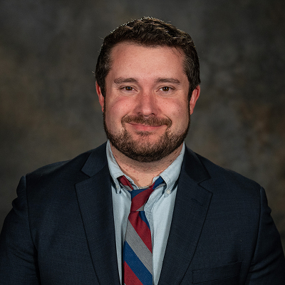 Professional portrait of councilmember Tommy Butler