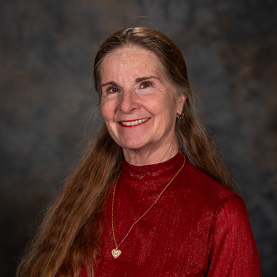 Professional portrait of councilmember Deb Deboutez