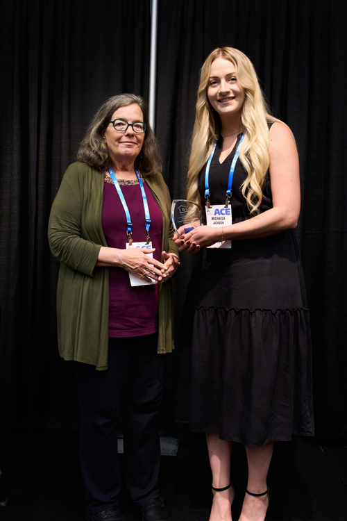 Michaela Jackson, Water Quality & Regulatory Compliance Manager, accepts an award.