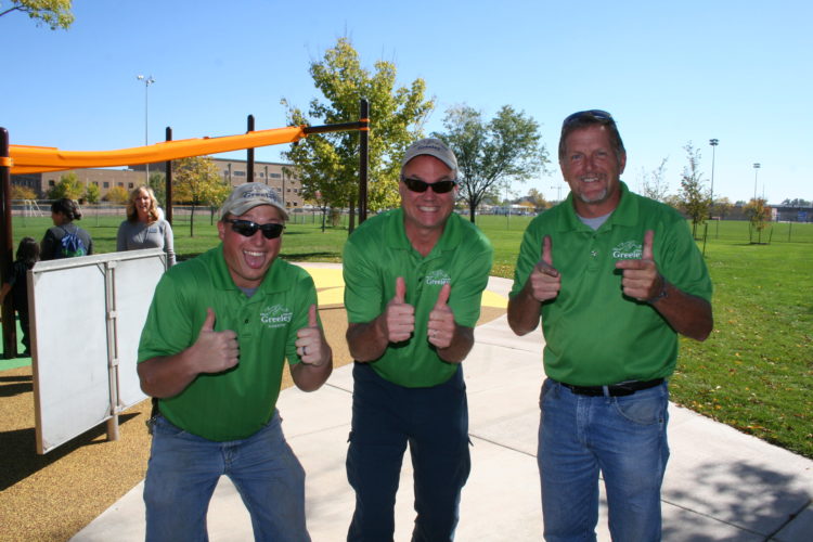 employees strike a pose at an employee event
