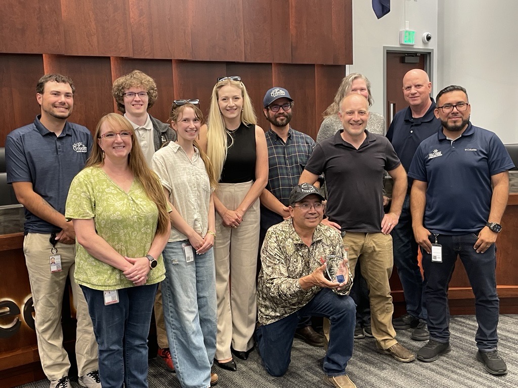 Members of Greeley’s Lead Protection Program pose with an award. 
