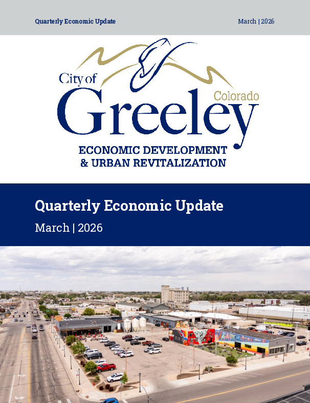 Image of report cover contains the works "Quarterly Economic Update" and "March 2026" at the top with a City of Greeley logo beneath.  In the center of the cover is a blue bar with the words "Quarterly Economic Update" and "March 2026".  Beneath those titles is an aerial image of downtown Greeley businesses at the corner of two intersecting roads.  One building has bright painted murals on two sides, and cars are parked throughout a concrete parking lot in front of multiple buildings.  