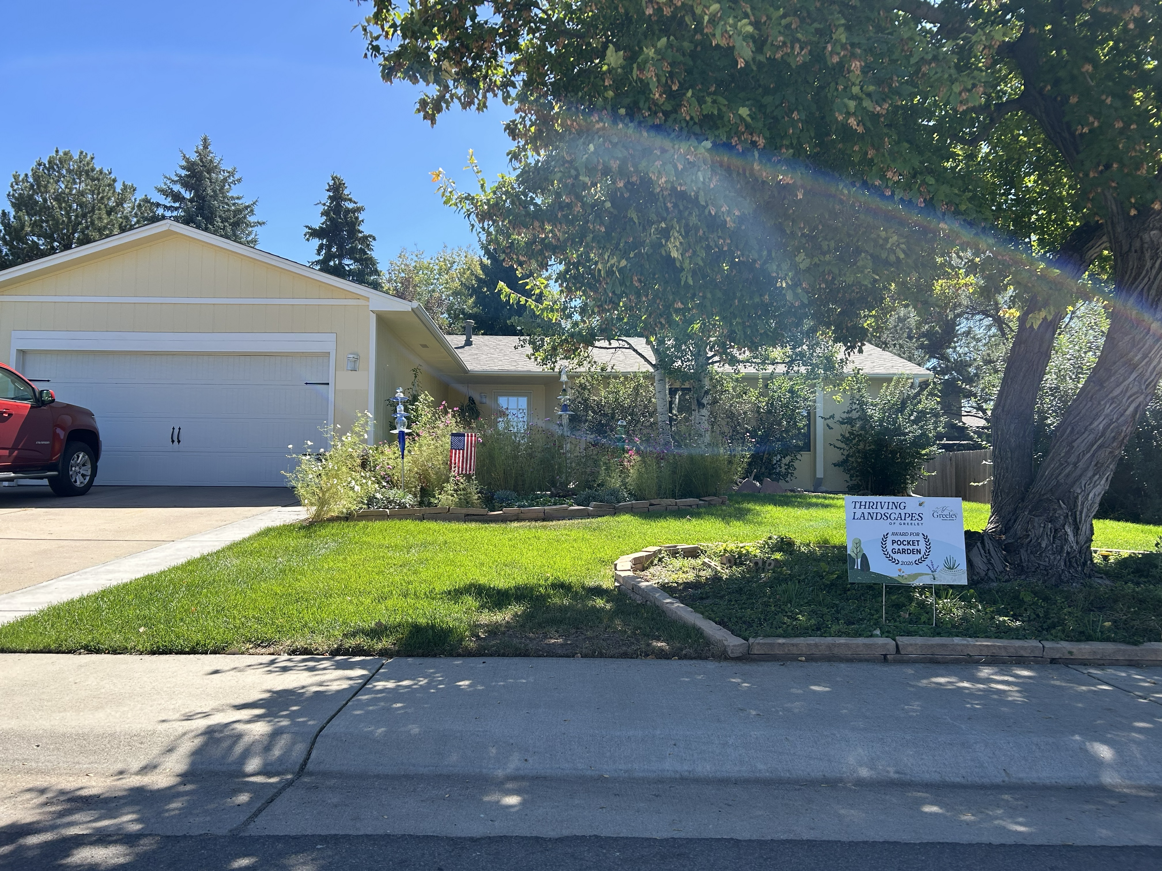 house with a waterwise landscape featured.
