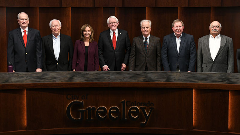 Seven Water Board members pose for a group photo in the council chambers